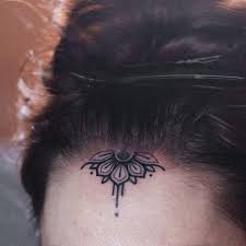 Image result for quirky pylon forehead tattoo