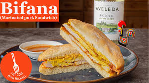 They are served on fresh bread that's soft, with a bit of a floured crust that holds the juices in. Bifana Portuguese Marinated Pork Sandwich Youtube