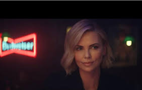 Hold My Beer Budweiser Charlize Theron Team Up For Budweiser Reserve Copper Lager Mybeerbuzz Com Bringing Charlize Theron Charlize Theron Hair Budweiser
