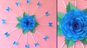 Sometimes paper flowers are better than real ones because they last longer and do not need maintenance. Paper Flower Wall Hanging Easy Wall Decoration Ideas Paper Craft Diy Wall Decor Youtube