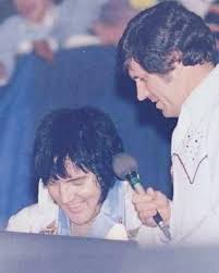 In June 1977, cameras captured Elvis Presley on stage for what would become  one of the most bittersweet moments in music history. Just weeks before his  death, he stood under the bright
