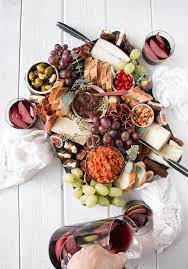 20 Easy Spanish Recipes To Throw The Best Tapas Party Ever Brit Co Tapas Party Easy Spanish Recipes Spanish Cheese