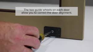 Cabinet sliding door tracks and rollers. How To Install Sliding Cabinet Doors Youtube