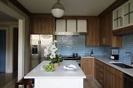 Phoebe Howard Dreamy Beach Kitchen With Driftwood Colored Wood Cabinets And Crisp White Island An Brown Kitchen Cabinets Kitchen Remodel Design Brown Kitchens