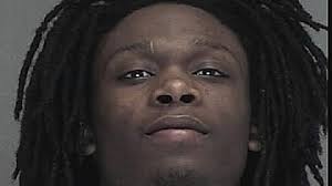 Suspect charged in Halloween mask robberies