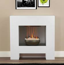 Contemporary surrounds can be made from a variety of rich materials, offer textural compliments to your fire and offer the opportunity to make bold design statements. Electric White Surround Pebble Fire Modern Contemporary Wall Fireplace Suite White Fireplace Surround Fireplace Suites White Fireplace