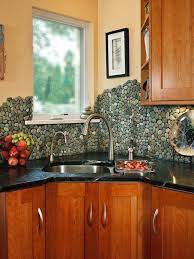 In this image, we can see grey glass tiles to provide a slight curve. Eye Candy 11 Totally Unique Diy Kitchen Backsplash Ideas Diy Kitchen Backsplash Trendy Kitchen Backsplash Diy Kitchen