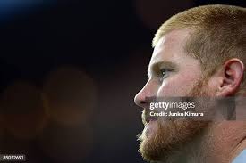 Outfielder Christopher Snelling of Australia returns to the field... News  Photo