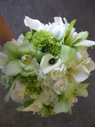 The different shades of color that run throughout each flower is what makes them look so realistic. Cymbidium Orchids Green Hydrangea Green Orchid Ivory Rose Mini Calla Lily Orchid W Flower Bouquet Wedding Green Wedding Bouquet Hydrangea Bouquet Wedding