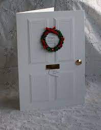 To give you an idea, there are some unconventional wreaths, banners, and swags that can be used on any door in the house. The Pinkshop Blog Christmas Door Tutorial Homemade Christmas Cards Diy Christmas Cards Christmas Cards Handmade