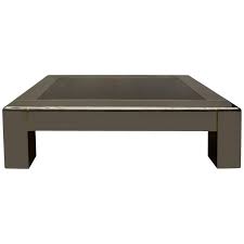 Karl springer style coffee table with lucite block legs and glass top. Karl Springer Gunmetal Brass Coffee Table For Sale At 1stdibs