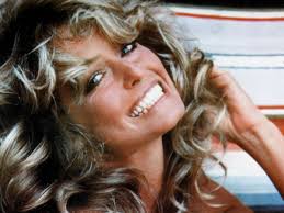 To transport your looks back to the '70s, try out farrah fawcett locks. The Story Behind Farrah Fawcett S Iconic 1976 Swimsuit Poster Biography