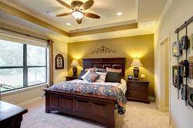 Lampsplus.com has been visited by 100k+ users in the past month The Master Bedroom Features A Tray Ceiling With Crown Molding Detail And Rece Master Bedroom Furniture Design Master Bedroom Furniture Bedroom Furniture Design
