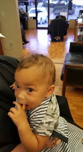 MJ received his first haircut the other day. His hair only grow