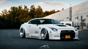 Liberty Walk Does Its Magic To White Debadged Nissan Gt R Nissan Gtr Nissan Gtr Wallpapers Gtr