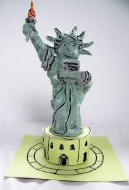 To make the statue of liberty crown into a crown shape you'll need to add an a strip of card stock onto the back that connects both edges. Miss Liberty The Art Annex Statue Of Liberty Statue Of Liberty Craft Statue