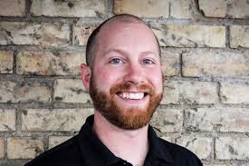 Prep football: Denfeld alum Lofald named head coach