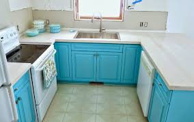To offset the formality of marble countertops in the rest of the kitchen, teak butcher block tops the island and warms the space. Solid Maple Diy Wood Countertops How To Make Wood Counters Dans Le Lakehouse