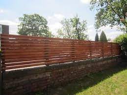 Wooden Slatted Fencing To Be Attached On Top Of A Garden Wall Backyard Retaining Walls Garden Wall Retaining Wall Fence