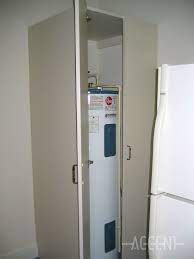 Cabinet To Hide Water Heater Laundry Room Remodel Hide Water Heater Water Heater Closet