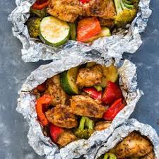 Foil Pack Cajun Chicken And Veggies With Boneless Skinless Chicken Breasts Zucchini Broccoli Florets Bell Pepper Healthy Recipes Veggie Recipes Foil Dinners