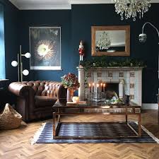 Let's take a look at some example to understand how to create the best dark themed living rooms. Christmas Living Room Decoration Samples To Have The Spirit Of Celebration Christmas D Blue Wall Decor Living Room Blue Living Room Decor Dark Blue Living Room