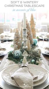 Classic white dinner plates and salad plates (i dress these up and down and they're only $23 for a set of 6!) Soft And Wintery Christmas Table With Touches Of French Blue