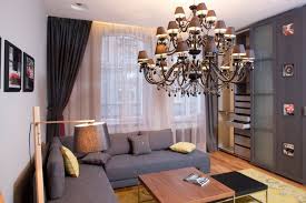 An upcycled wood crate is a really good idea. Modern Small Apartment Living Room Grey Modular Sofa Square Wooden Coffee Table Innovative Diy Wooden Reading Lamp Grey Storage Wall Panel Elegant Ceiling Mount Iron Chandelier Pendan Nancy Hugo