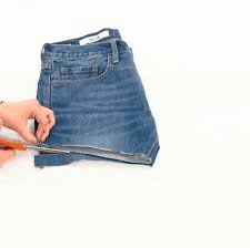 How to make distressed denim cut off shorts from jeans! Denim Cutoff Tutorial How To Turn Jeans Into Cutoff Shorts