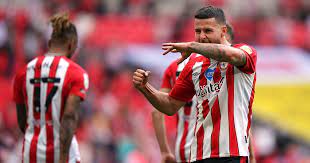 Brentford pummelled swansea to lay their wembley demons to rest and win promotion to the premier league.an ivan toney penalty put the bees in front ea. Lnc7iuugxe2bom