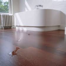 The grain patterns, bumps and knots in hardwood and softwood floorboards create a varied and textured look missing from floating wood laminate floors. Using Hardwood Flooring In A Bathroom What You Should Know