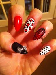 Black And Red Stiletto Nails Black White And Red Stiletto Nails With Leopard And Polka Dots Red Stiletto Nails White Nails Stiletto Nails