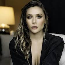 I also just noticed that my husband put 'little miss magic' [in. Elizabeth Olsen Bio Age Net Worth Height In Relation Nationality Body Measurement Career