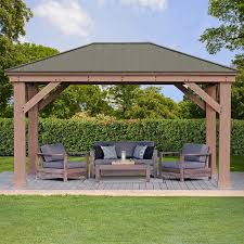 Sunbeam round ceramic tile top fire table black 50,000 btu; Yardistry 12 Ft 16 Ft Cedar Gazebo With Aluminum Roof Costco