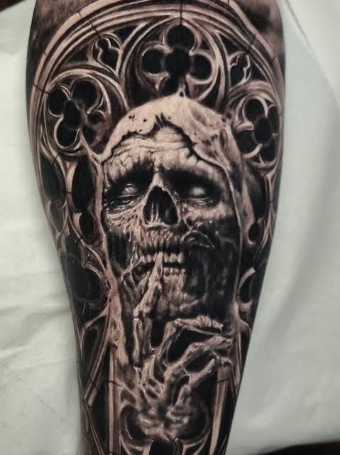 Powerful Grim Reaper Tattoo with Gothic Elements
