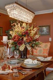Gathering flowers from the garden for display is a great way to freshen up your dining room table. Dining Table Floral Decorations Novocom Top