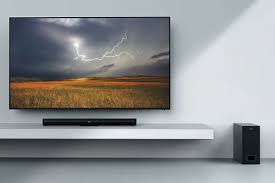 These add far louder and better quality sound to your tv this is a soundbase rather than a soundbar, so the tv stands on top of it. How To Buy A Soundbar Here S An In Depth Overview Digital Trends