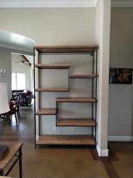 Should you be going for something traditional and classic or more modern and rustic, we can provide a range of pieces to suit your lounge and living room interior. Steel And Solid Hardwood Arlo Shelving Unit In 2021 Wood Shelving Units Wood Shelves Shelves