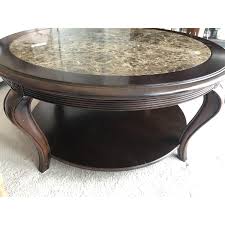 Get an oval or rectangular shape for the small room square and round shapes will fit well in a big seating arrangement like sectional sofas or love seat oval and round. Raymour Flanigan Round Marble Top Cherry Wood Coffee Table Aptdeco