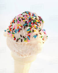 Ice cream cone with sprinkles. An Ice Cream Cone With Sprinkles Stock Photo Dissolve