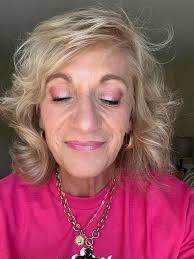 Sunflower showing off her lashes and donut 🍩 💁🏼‍♀️