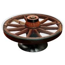 Bullock reclaimed wagon wheel coffee table a repurposed wagon wheel and reclaimed wood create the perfect mix in our coffee table.each is one of a kind and finished with a hand applied whitewash to enhance its authentic character. Wagon Wheel Coffee Table For Sale At 1stdibs