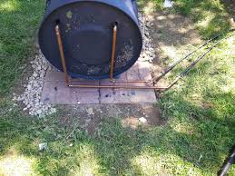 Wood Burning Pool Heater Heat Your Pool For Free Simple Suburban Living Pool Heater Diy Pool Heater Swimming Pool Heaters