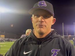 Former University of Arkansas coach Houston Nutt rooting