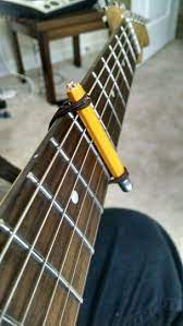 Here S My Own Version Of The Diy Guitar Capo Haha Ukulele Design Guitar Capo Ukulele Capo