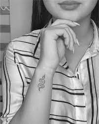 25 Amazing Small Snake Tattoo Ideas Designs Small Snake Tattoo Snake Tattoo Ideas Tattoos
