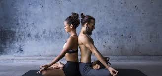 10 Couples Yoga Poses That Strengthen Your Relationship Couples Yoga Poses Couples Yoga Partner Yoga Poses