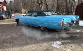 Image result for Alpine Turquoise 1965 Cadillac