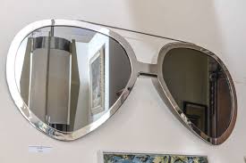 You can create even more visual interest to your walls, augmenting the charm that a single mirror offers. Oversized Aviator Mirror Sunglasses At 1stdibs