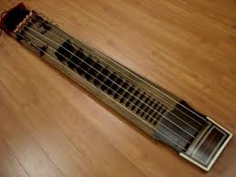 A female korean shaman (mudang) may use many combinations of musical instruments. Korean Traditional Instrument Komungo Korean Traditional Traditional Instruments